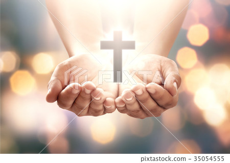 Human hand with shape cross in open palm Human hand with shape cross in open palm 35054555
