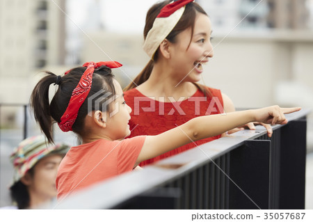 Parents and children on a veranda Parents and children on a veranda 35057687