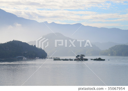 Scenery fog lake mountain morning morning sun moon lake taiwan sunrise haze fog sky small island tourist attraction tree mystery 35067954