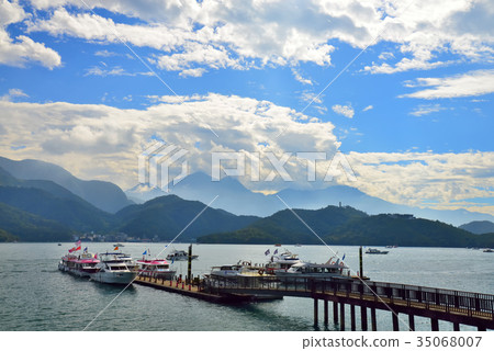 Scenery lake cloud boat mountain Taiwan sun moon lake pier deck sky lake water activity tourism leisure leisure activity sunny 35068007