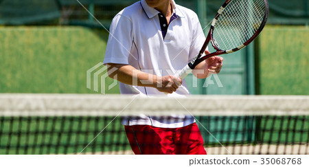 A man playing tennis 35068768