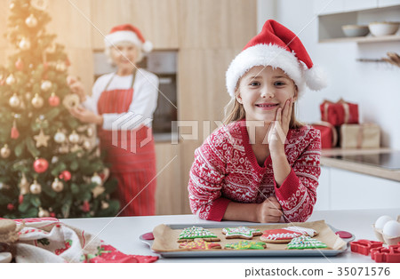 Happy family celebrating holiday with sweet Happy family celebrating holiday with sweet 35071576