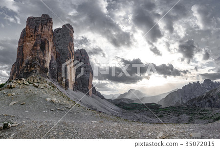 Tre Cime di Lavaredo at sunset with gray sky 35072015