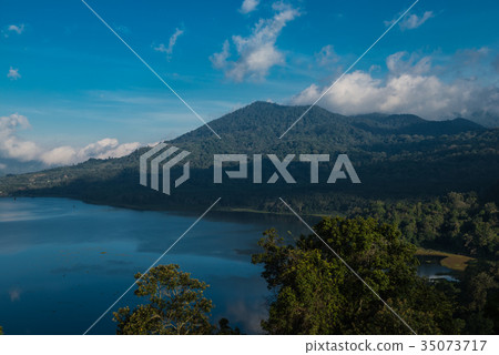 Beatiful view over the lake. Lake and mountain Beatiful view over the lake. Lake and mountain 35073717