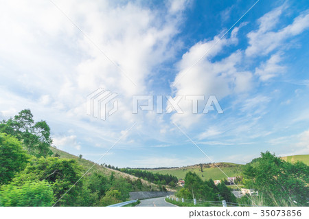 Beautiful landscape view of a country road Beautiful landscape view of a country road 35073856
