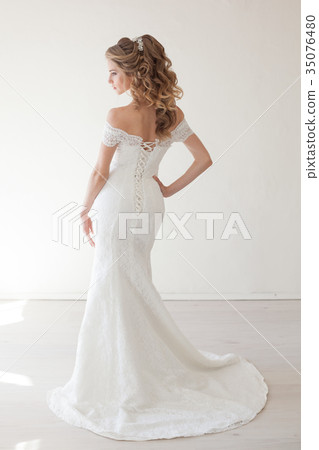 beautiful bride posing wedding hairstyle and dress beautiful bride posing wedding hairstyle and dress 35076480