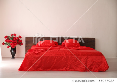 the Interior of the white room with a bed with red the Interior of the white room with a bed with red 35077982