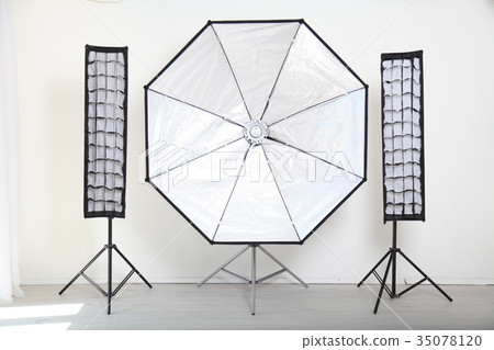Flash on a white background in the Photo Studio Flash on a white background in the Photo Studio 35078120