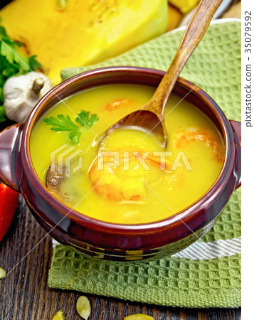 Soup-puree pumpkin with prawns and champignons 35079592