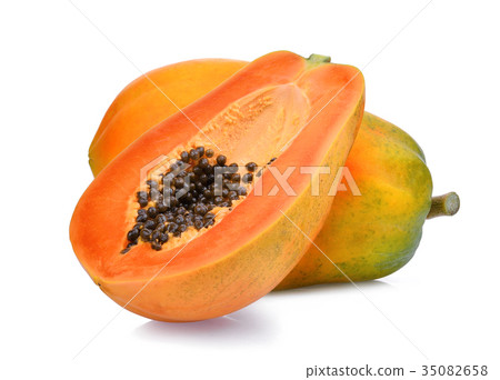 whole and half of ripe papaya fruit with seeds  35082658