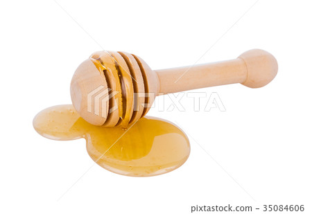 honey and stick isolated on white background honey and stick isolated on white background 35084606