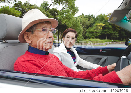 Elderly couple drive wealthy people 35085008
