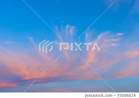Red cirrus cloud with blue sky. 35086024