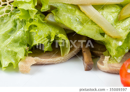 Beef tongue, mushrooms and green salad 35089397