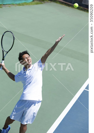 A man playing tennis 35090209