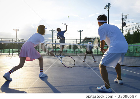 Men and women playing tennis Doubles 35090587