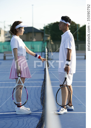 Men and women in the tennis court Men and women in the tennis court 35090792