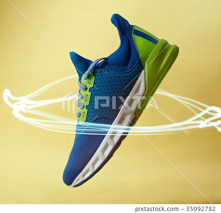 New modern running shoe in light circle 35092782
