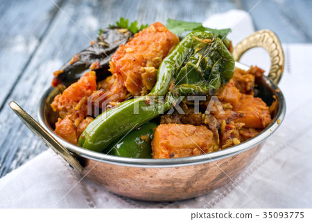 Indian Vegetable Curry Fry with Sweet Potatos and  35093775