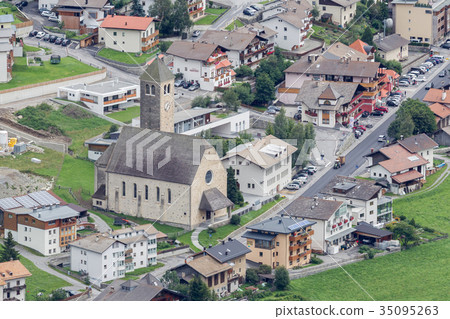 Beautiful view on the village of Reshen, the Alps 35095263