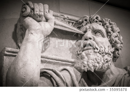 Head and shoulders detail of the ancient sculpture 35095878