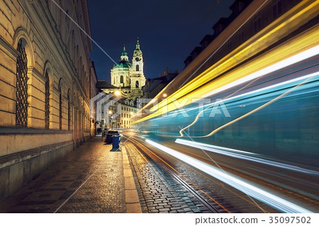 Traffic on the ancient street in Prague Traffic on the ancient street in Prague 35097502
