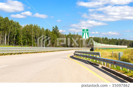 Toll road. Russian highway number M11 in summer  35097862