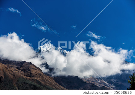 Mountain in the clouds 35098656