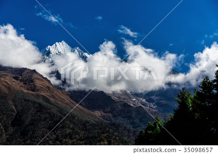 Mountain in the clouds 35098657