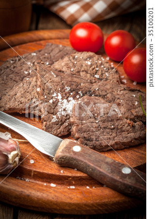 Slices of fried beef. Slices of fried beef. 35100201