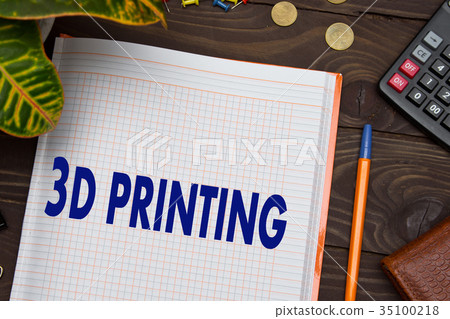 Notebook with a notes 3D PRINTING on the office 35100218