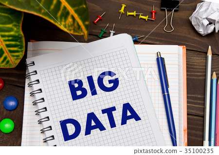 Notebook with a notes BIG DATA on the office table Notebook with a notes BIG DATA on the office table 35100235
