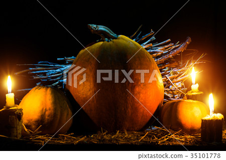 Photo for the holiday Halloween. Evil pumpkin lamp Photo for the holiday Halloween. Evil pumpkin lamp 35101778