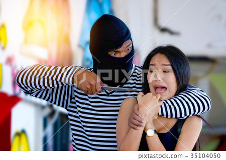 Criminal threatening with knife to scared woman 35104050