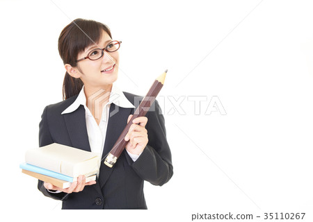 Smiling female teacher Smiling female teacher 35110267