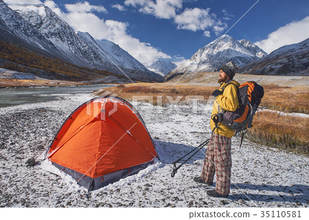 Hiker with backpack at camping in the mountains 35110581