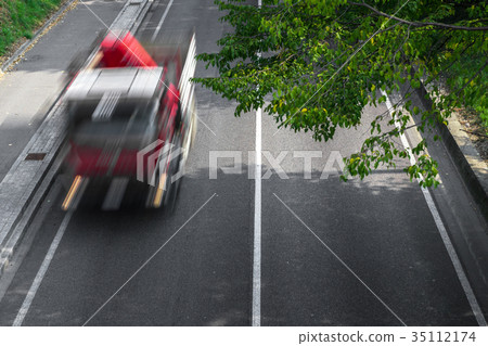 Motion blur of cars over the road Motion blur of cars over the road 35112174