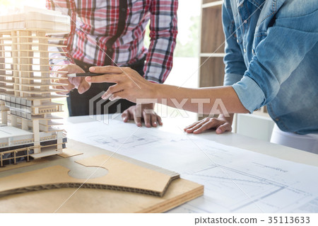 Architect working on blueprint, Engineer meeting working with pa 35113633