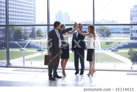 Business people group joining hands 35114015