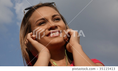 Woman Listening To Music Woman Listening To Music 35115413