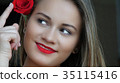 Young Woman With Red Rose 35115416