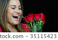 Woman Receiving Gift Of Flowers 35115423