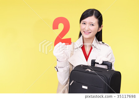 A smiling woman with numbers 35117698