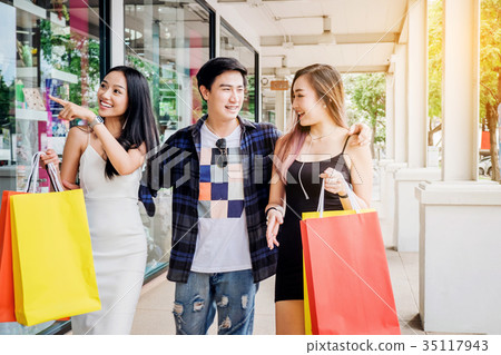 Shopping Asian friends are walking and shopping  35117943