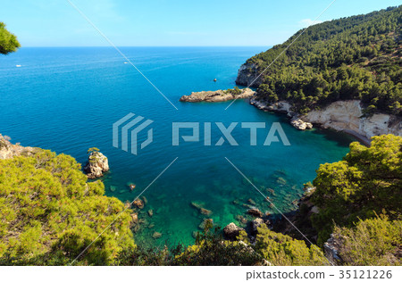 Summer beach Cala di Porto Greco, Italy Summer beach Cala di Porto Greco, Italy 35121226