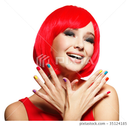 Surprised face of  pretty woman  with  red hair and multicolor n 35124185