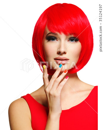 Closeup face of a beautiful  girl with  multicolor nails. 35124197