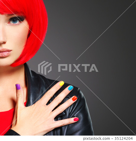 Gorgeous fashion woman with red hair and black jacket 35124204