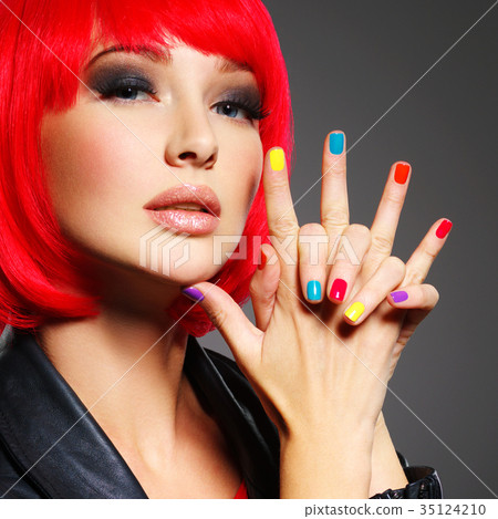 Gorgeous fashion woman with red hair and black jacket 35124210