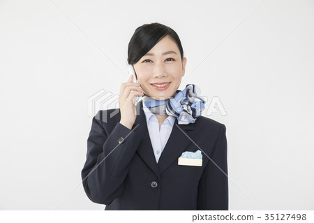 CA cabin attendant talking on smartphone 35127498
